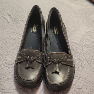 Clarks Black Flats with Tassels and Moccasin Stitching